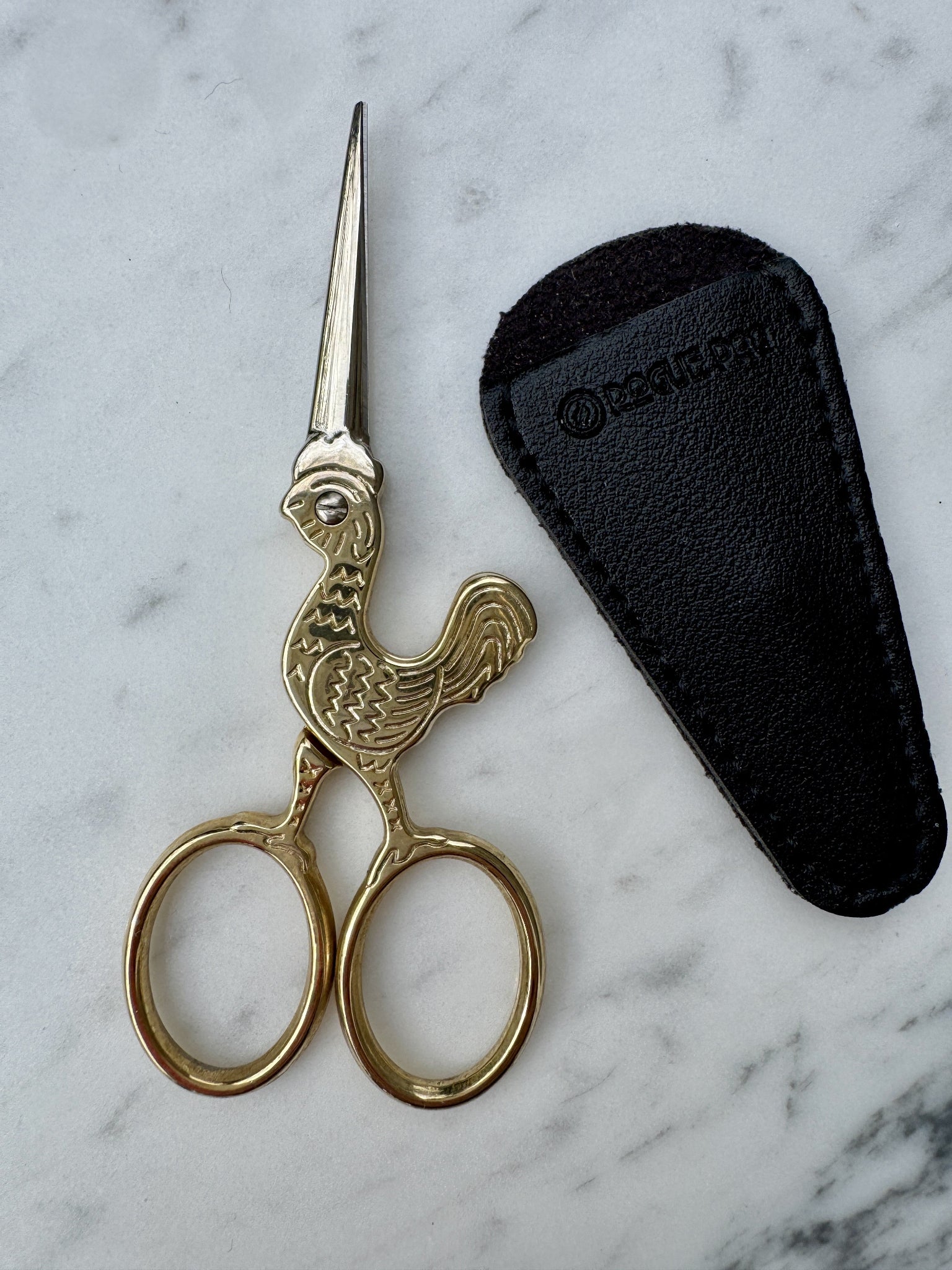 Gold tone rooster scissors to make your ritual a bit more whimsical. These scissors are made of premium quality stainless steel and are 4" for easy travel.