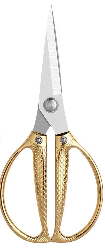 XL Snake Scale Scissors on white backgdround to show detail at the handles. The scissors are extremely durable and of excellent quality. They are stainless steel.