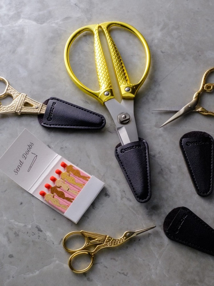 Vegan leather blade covers fit all Rogue Paq scissors and make these beautiful tools safe for travel.