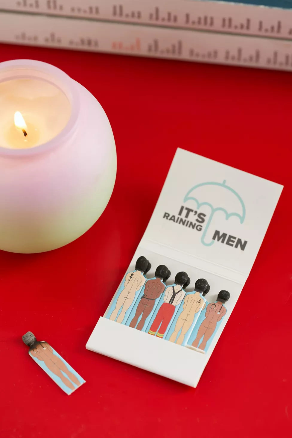 It's Raining Men AKA Send Dudes Matches are a perfect combination of whimsy and utility. These tiny men will strike fire as well as a conversation. They are an essential piece of a well curated luxury ritual.