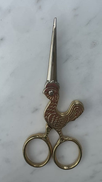 Video showing the Coq of the Walk Scissors and their beautiful gold tone finish in the sunlight.