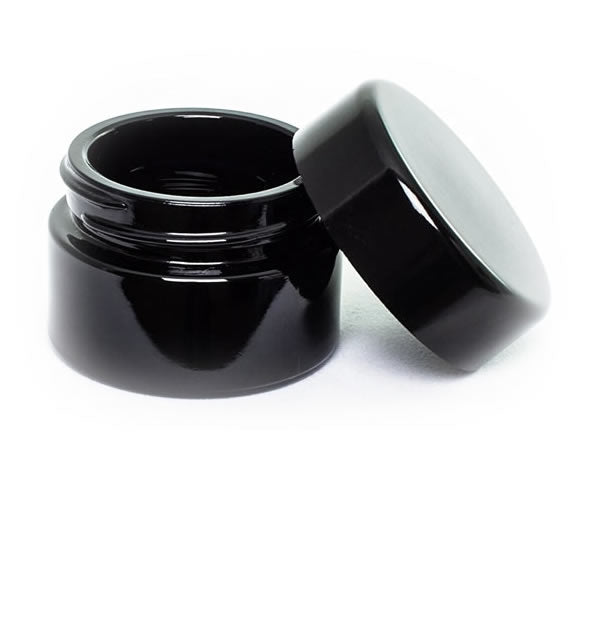 Rogue Paq Open ultraviolet black glass cannabis storage jar perfect for storing your precious flower in order to keep it fresh.